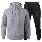 A 2-piece men's outdoor fitness sportswear set featuring a hooded long-sleeved sweatshirt, pullover and casual pants for autumn