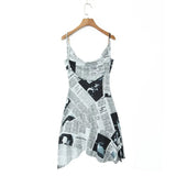YENKYE New Women Newspaper Letter Print Irregular Hem Sling Dresses Fashion Backless Thin Straps With Chain Summer Sexy Dress