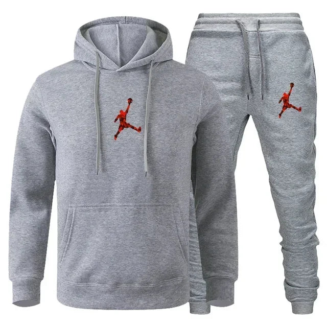 A 2-piece men's outdoor fitness sportswear set featuring a hooded long-sleeved sweatshirt, pullover and casual pants for autumn