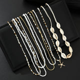 7Pcs/Set Boho Starfish Conch Rice Beads Pendant Necklace for Women Fashion White Color Multi layered Necklace Set Summer Jewelry