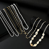 7Pcs/Set Boho Starfish Conch Rice Beads Pendant Necklace for Women Fashion White Color Multi layered Necklace Set Summer Jewelry