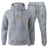 A 2-piece men's outdoor fitness sportswear set featuring a hooded long-sleeved sweatshirt, pullover and casual pants for autumn